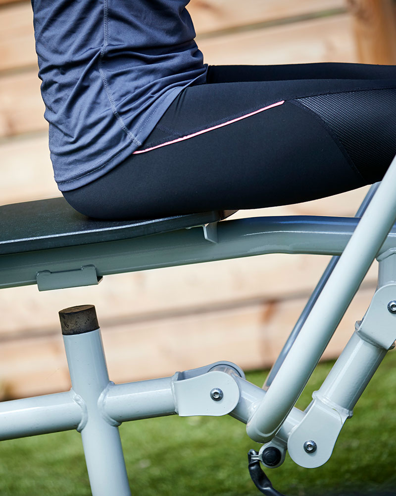 Close up of a seat for an outdoor exercise station, it shows how all the components are joined up to focus on quality of material and design.